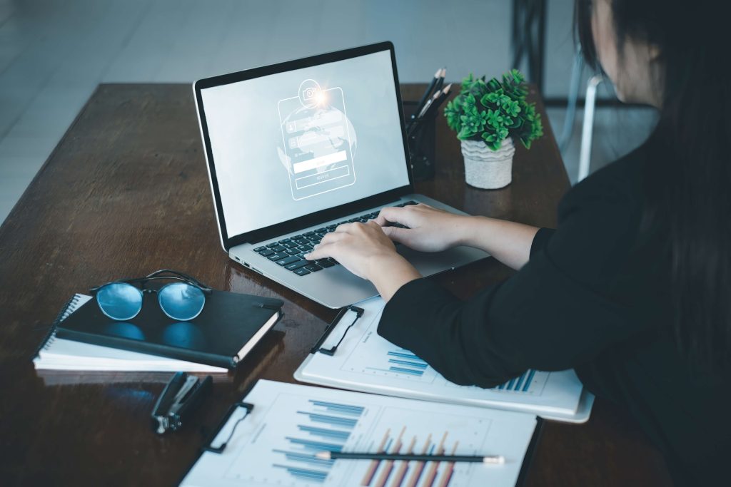 woman logging on to business system